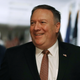 CIA Director Mike Pompeo smiles as he walks to a meeting with Sen. Mark Warner (D-Va.) on Capitol Hill in Washington, D.C., on April 18, 2018. President Donald Trump has nominated Pompeo to become the next secretary of state.